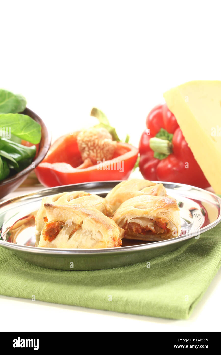 Puff pastry with bell peppers and cheese filling Stock Photo