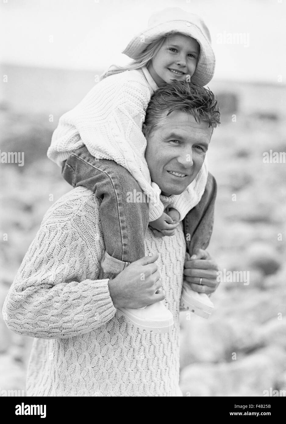 35-39 years 45-49 years black and white closeness consideration daughter elementary age family family with one child fashion Stock Photo