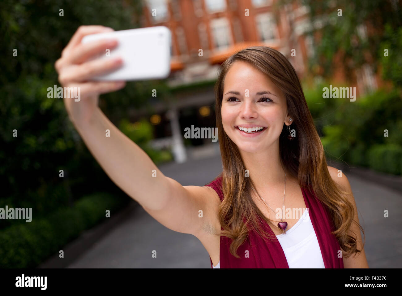 young woman taking a selfie Stock Photo - Alamy