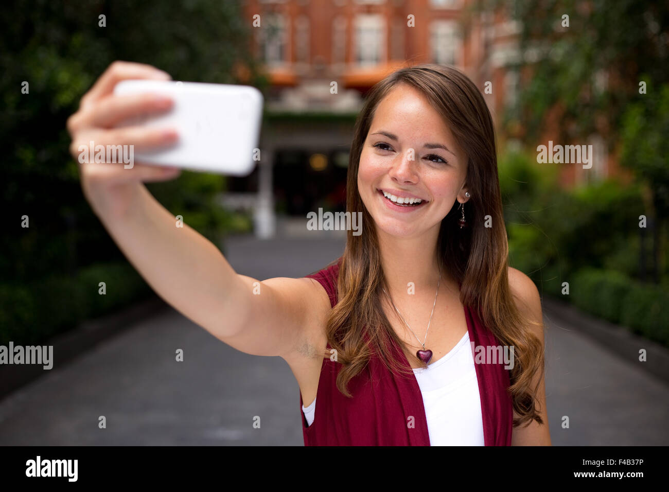 young woman taking a selfie Stock Photo - Alamy