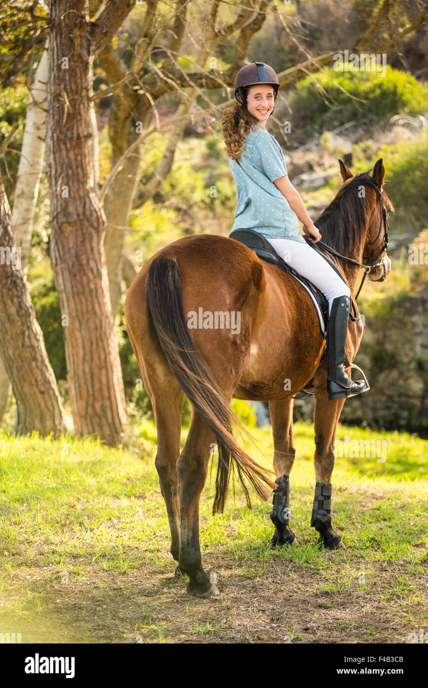 Young woman riding her horse Stock Photo Alamy