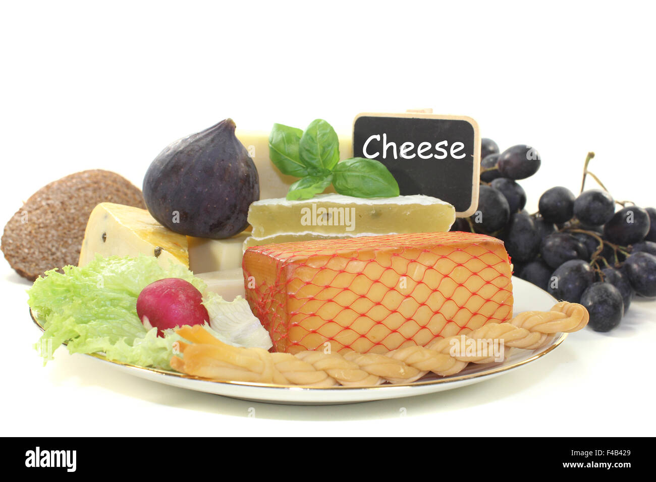 pieces of cheese with blackboard Stock Photo Alamy