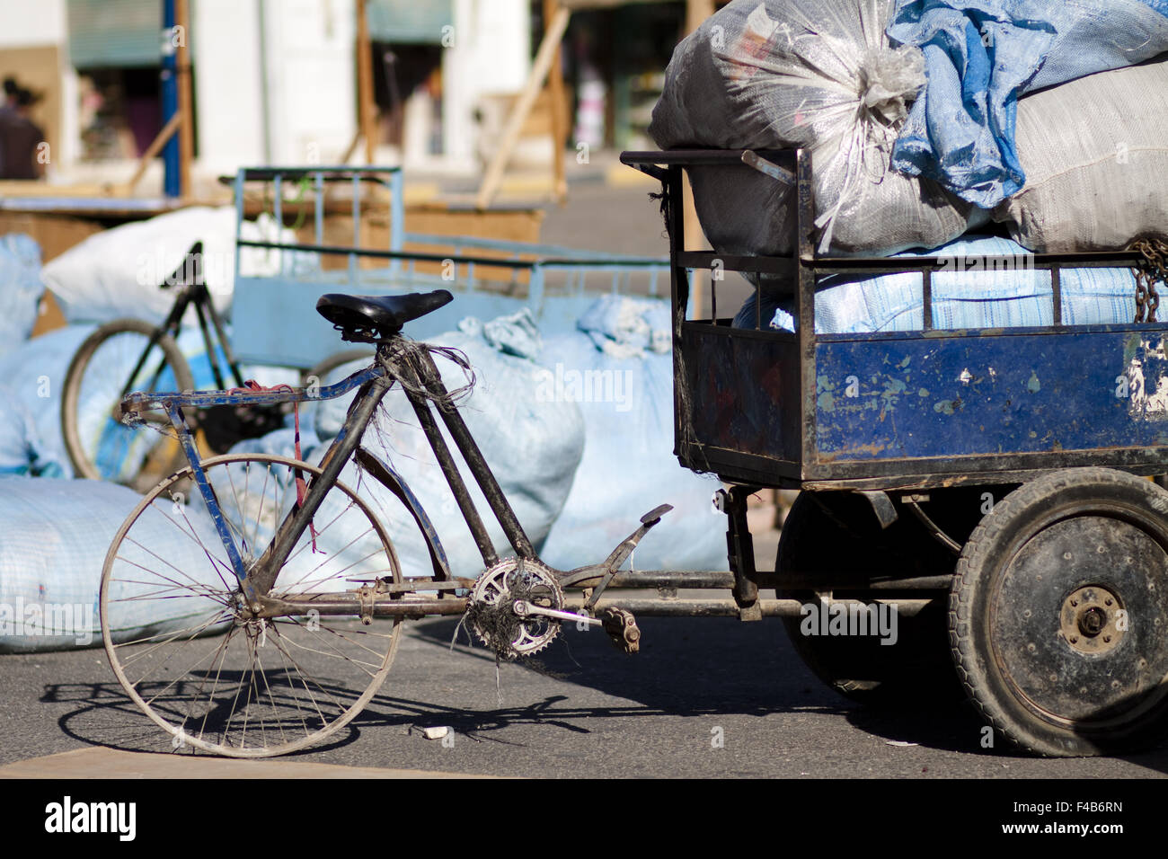 Old bicycle load with cart completely Stock Photo