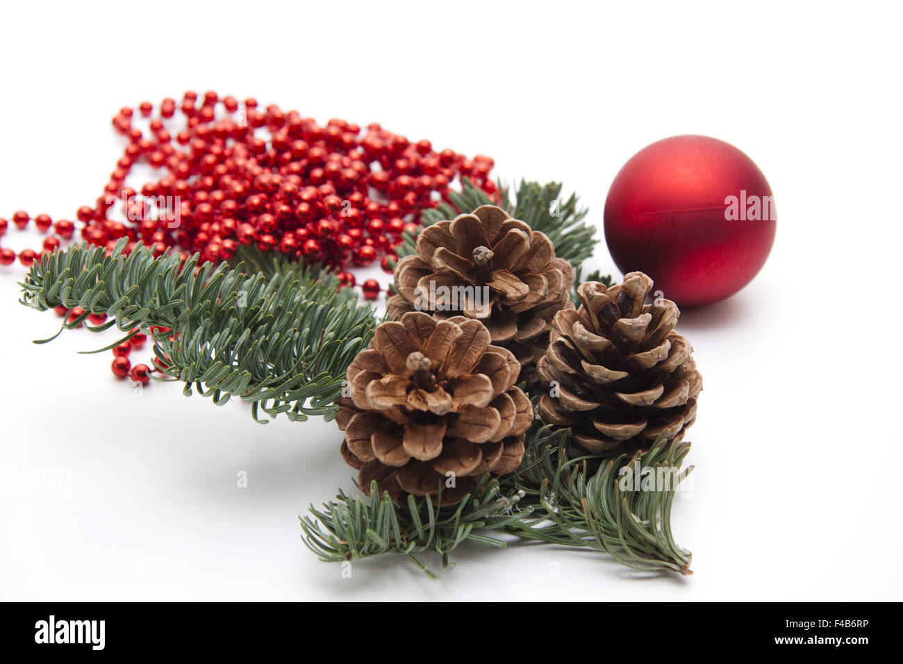 Christmas sphere and pine cone Stock Photo