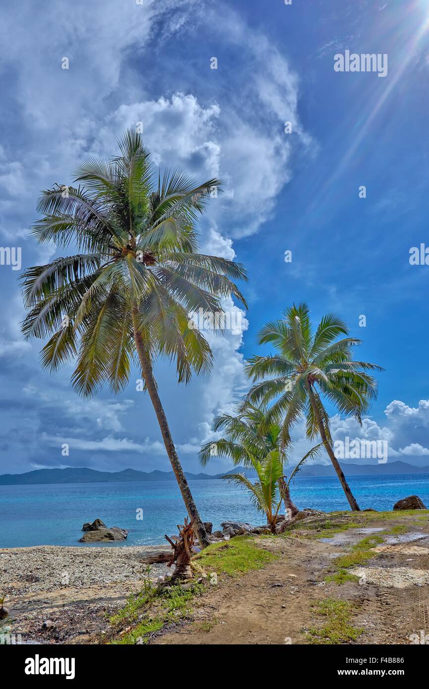 Doini Island PNG Papua New Guinea Tourism Island Cliché Sun Flare P Stock Photo
