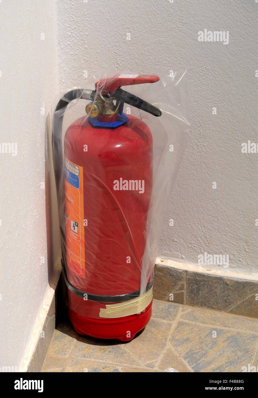 A red fire extinguisher Stock Photo Alamy