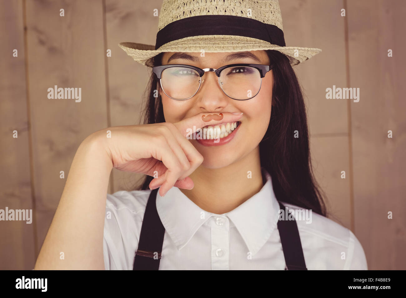 Hipster with mustache on finger Stock Photo