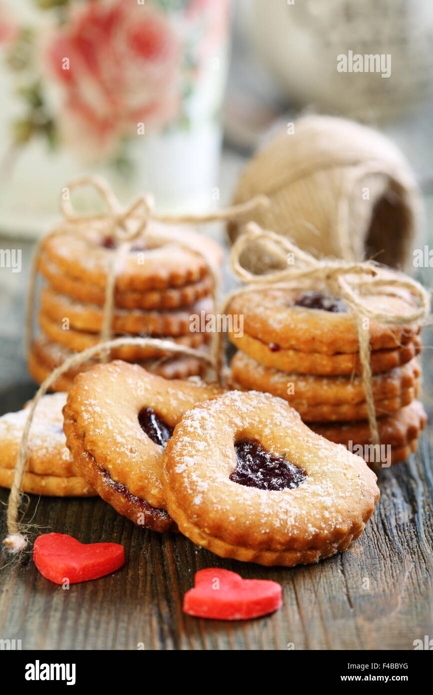 Biscuits and marzipan red hearts. Stock Photo