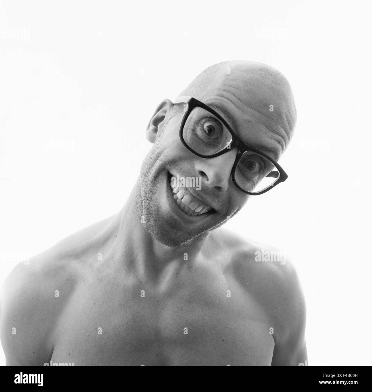 30-34 years adults only bald headed black and white body language catalogue 2 conceptual emotional series expression facial Stock Photo