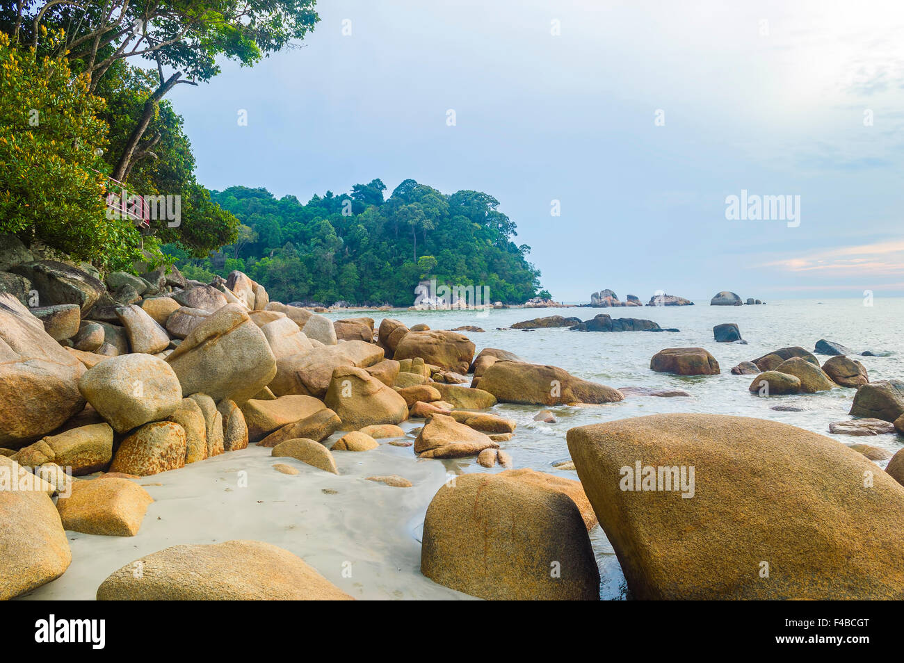 Rock beach at sea shore Stock Photo - Alamy