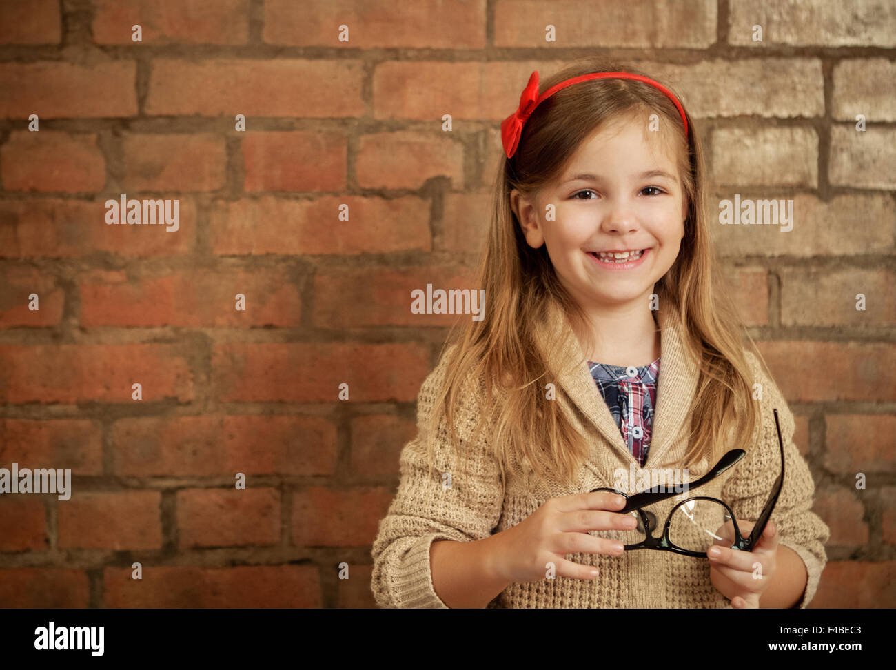 Funny little girl with glasses Stock Photo Alamy