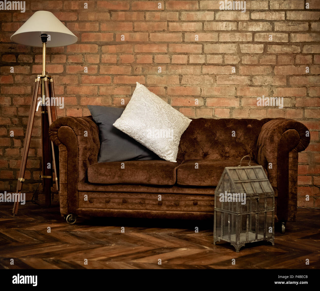 Interior of loft with velvet sofa Stock Photo Alamy