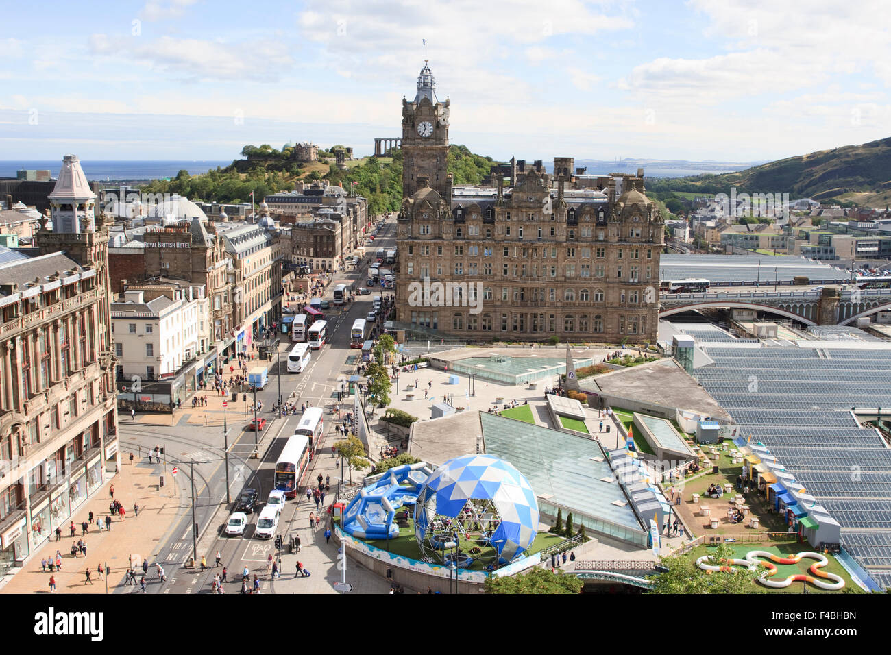 The Balmoral Hotel & Waverley Station as seen from the Scott Monument in Princes Street Gardens, Edinburgh, Scotland. Stock Photo