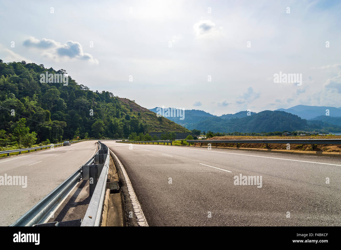 Bridge and asphalt road with blue skies Stock Photo - Alamy