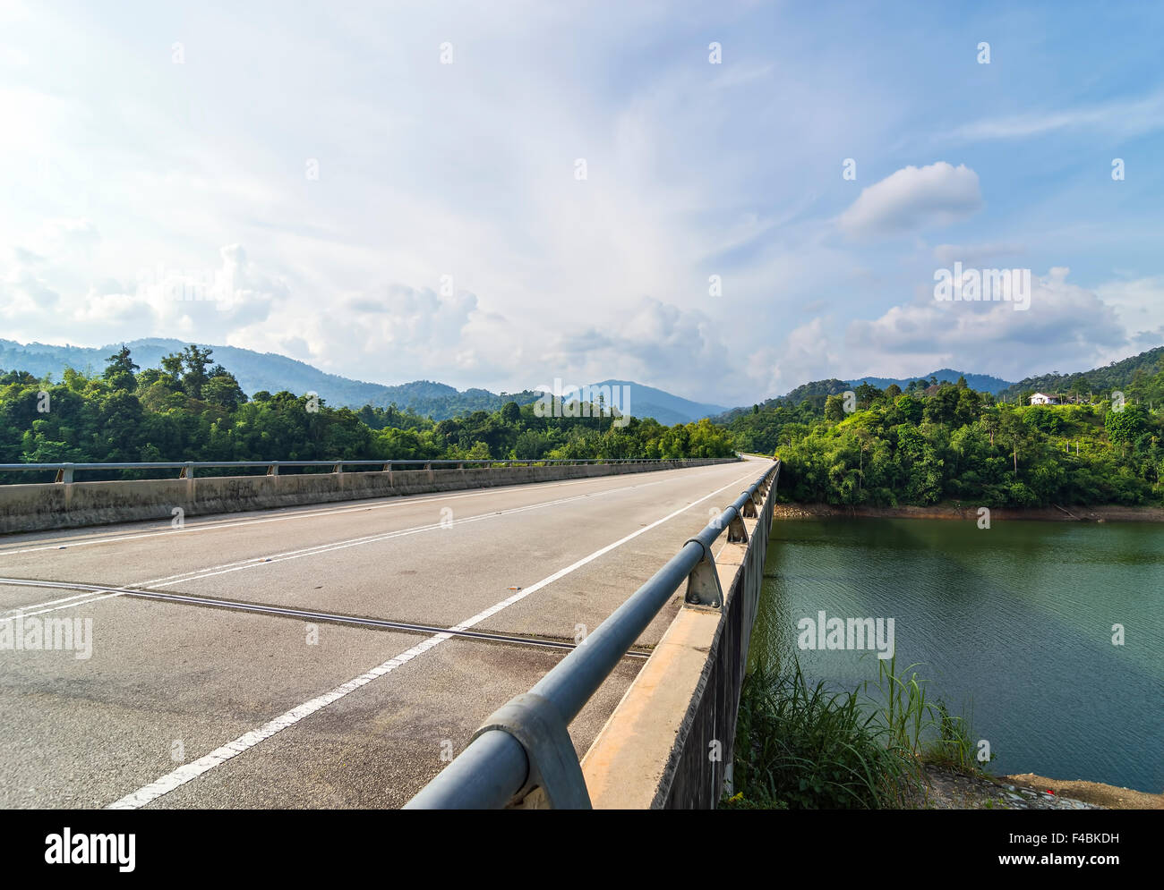 Bridge and asphalt road with blue skies Stock Photo - Alamy