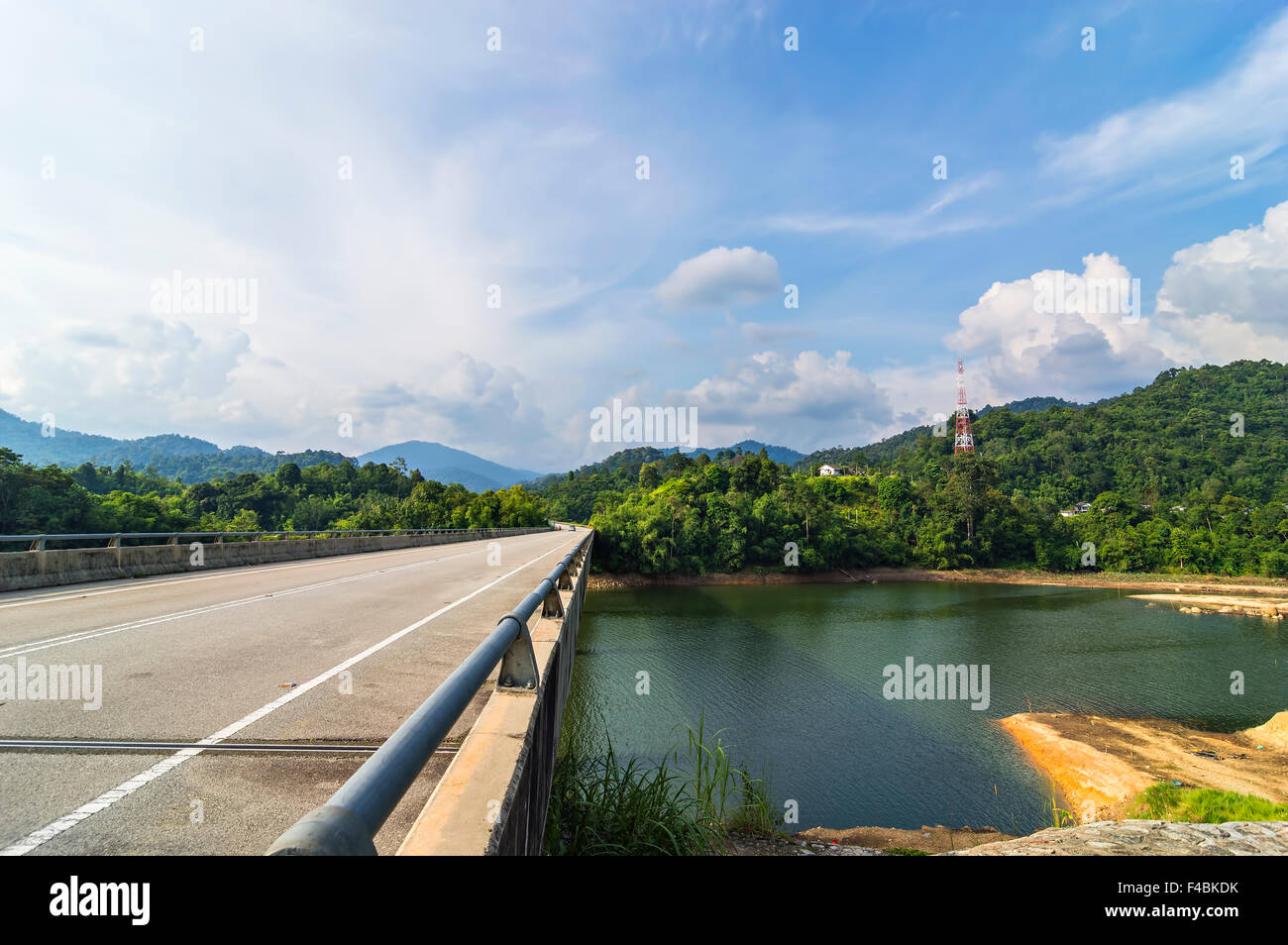 Bridge and asphalt road with blue skies Stock Photo - Alamy