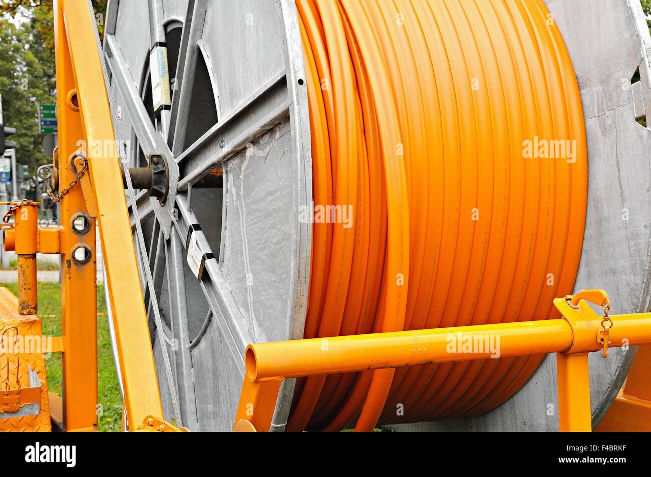 Broadband cable drum with laying trailer Stock Photo