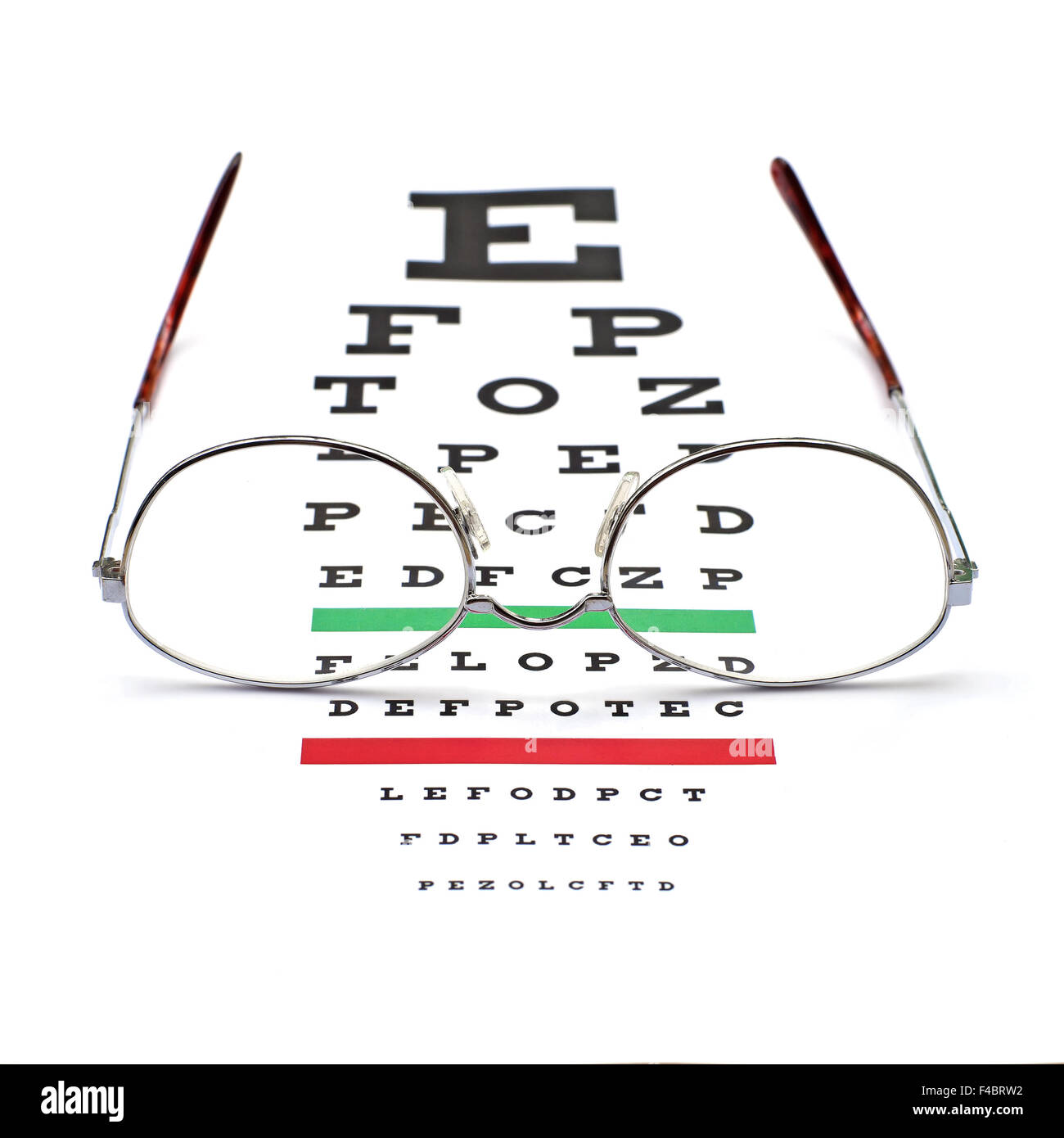 glasses on snellen eye sight chart test background Stock Photo