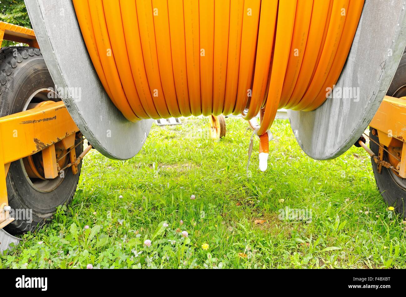 Cable drum trailer with broadband cable drum Stock Photo