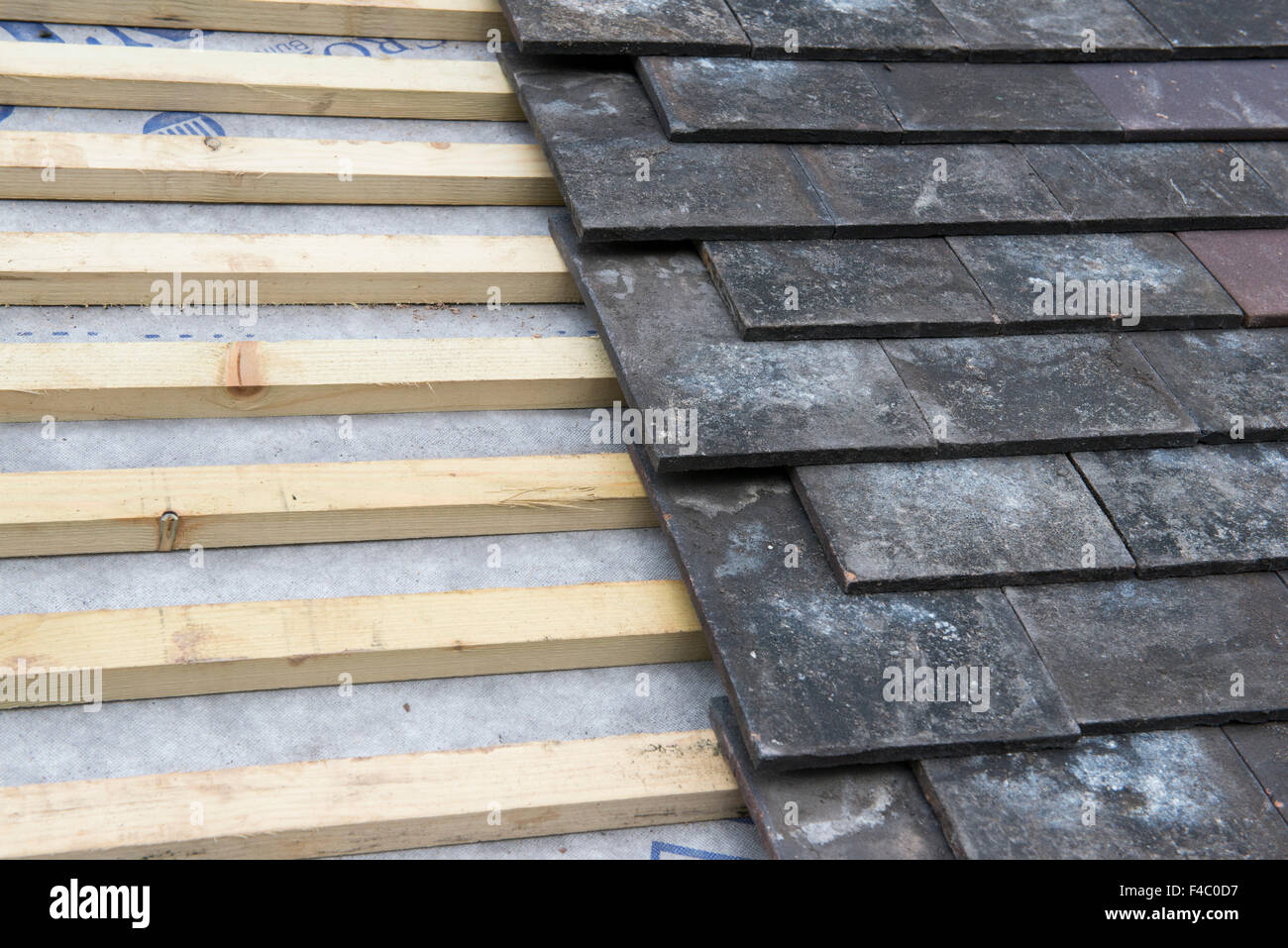 Roofing battens and tiles on a roof under construction Stock Photo Alamy