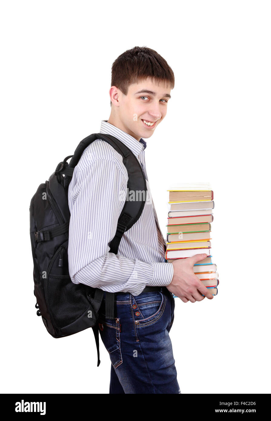 Teen boy carrying books hi-res stock photography and images - Alamy