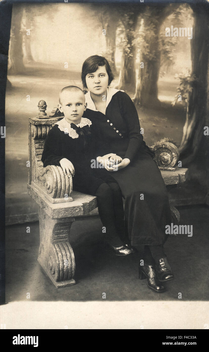 Vintage portrait of a mother and her little daughter, circa 1925, St.Petersburg, Russia Stock Photo