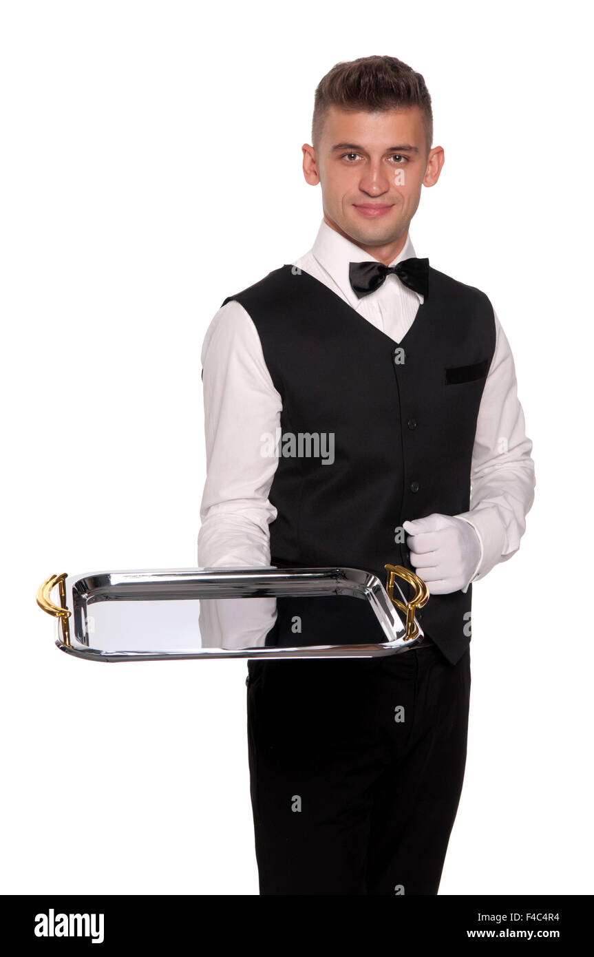 A young boy waiter with a tray Stock Photo