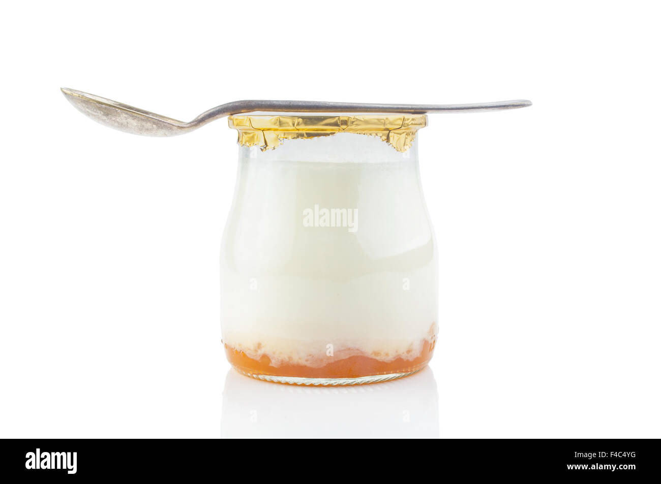Greek yogurt in a glass jar with spoon Stock Photo Alamy