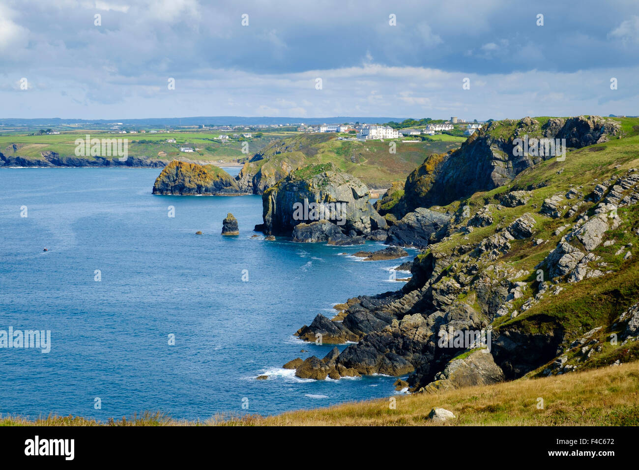 View of Cornish coast UK from South West Coast Path at Mullion Cove, Lizard Peninsula, Cornwall, UK Stock Photo