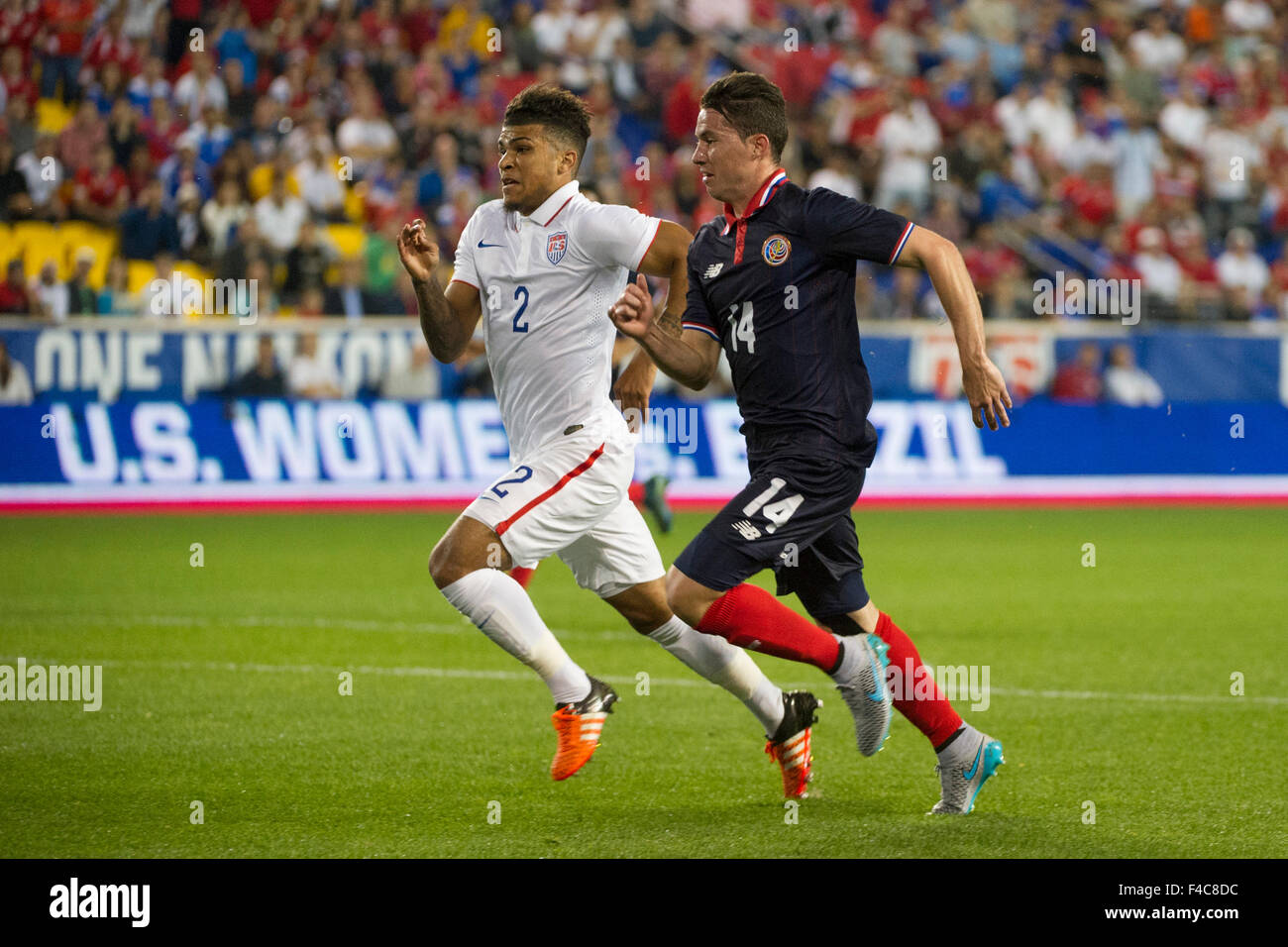October 13, 2015: USA defender DeAndre Yedlin (2) and Costa Rica defender Bryan Jose Oviedo (14) are in action USA Men's National Team vs. Costa Rica Men's National Team- international friendly at Red Bull Arena - Harrison, NJ. Costa Rica defeated The US Men's National Team 1-0. Mandatory Credit: Kostas Lymperopoulos/Cal Sport Media Stock Photo