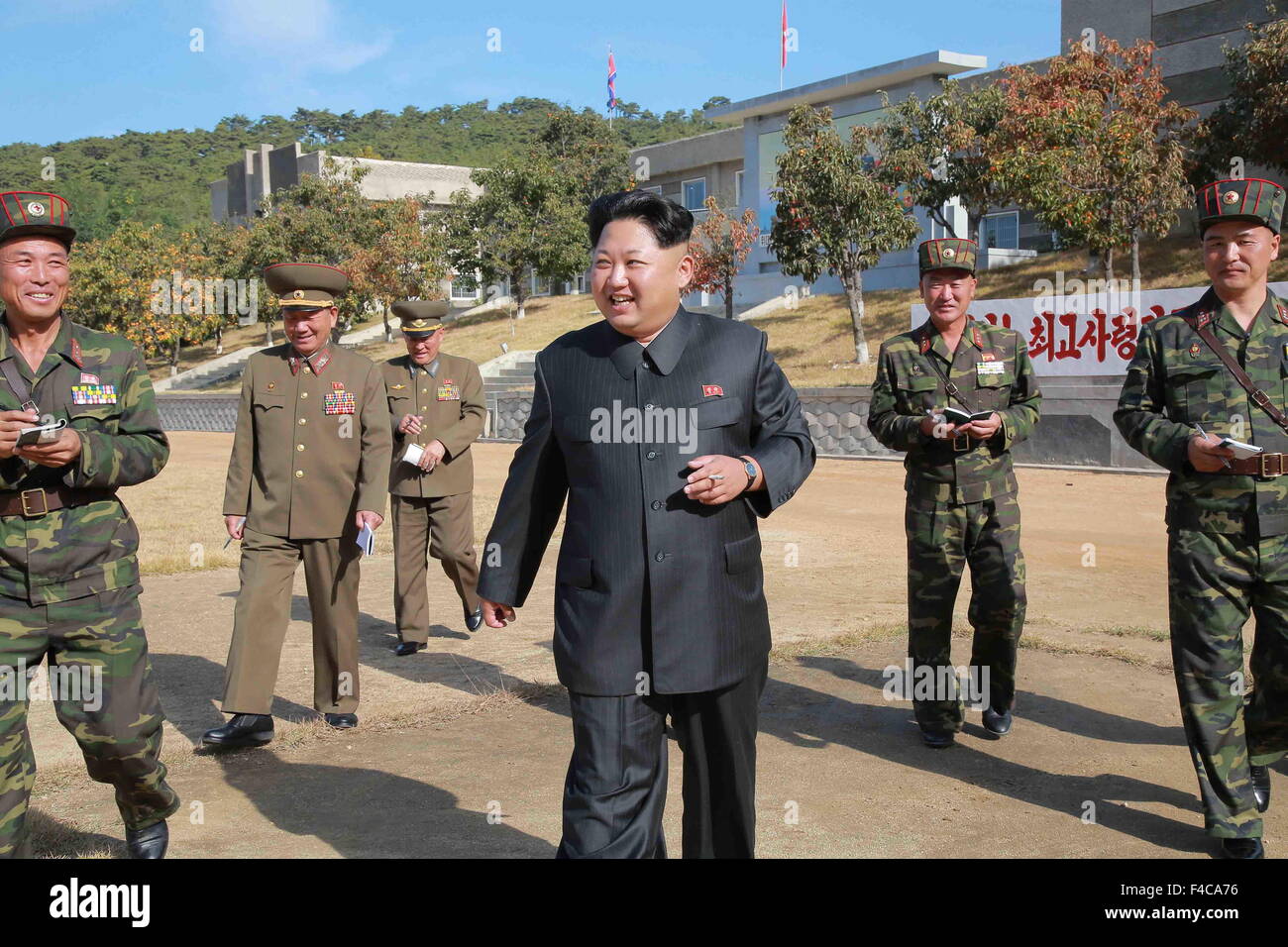 Pyongyang. 16th Oct, 2015. Photo provided by Korean Central News Agency (KCNA) on Oct. 16, 2015 shows top leader of the Democratic People's Republic of Korea (DPRK) Kim Jong Un (C) recently inspecting Unit 350 of Korean People's Army (KPA). Credit:  KCNA/Xinhua/Alamy Live News Stock Photo