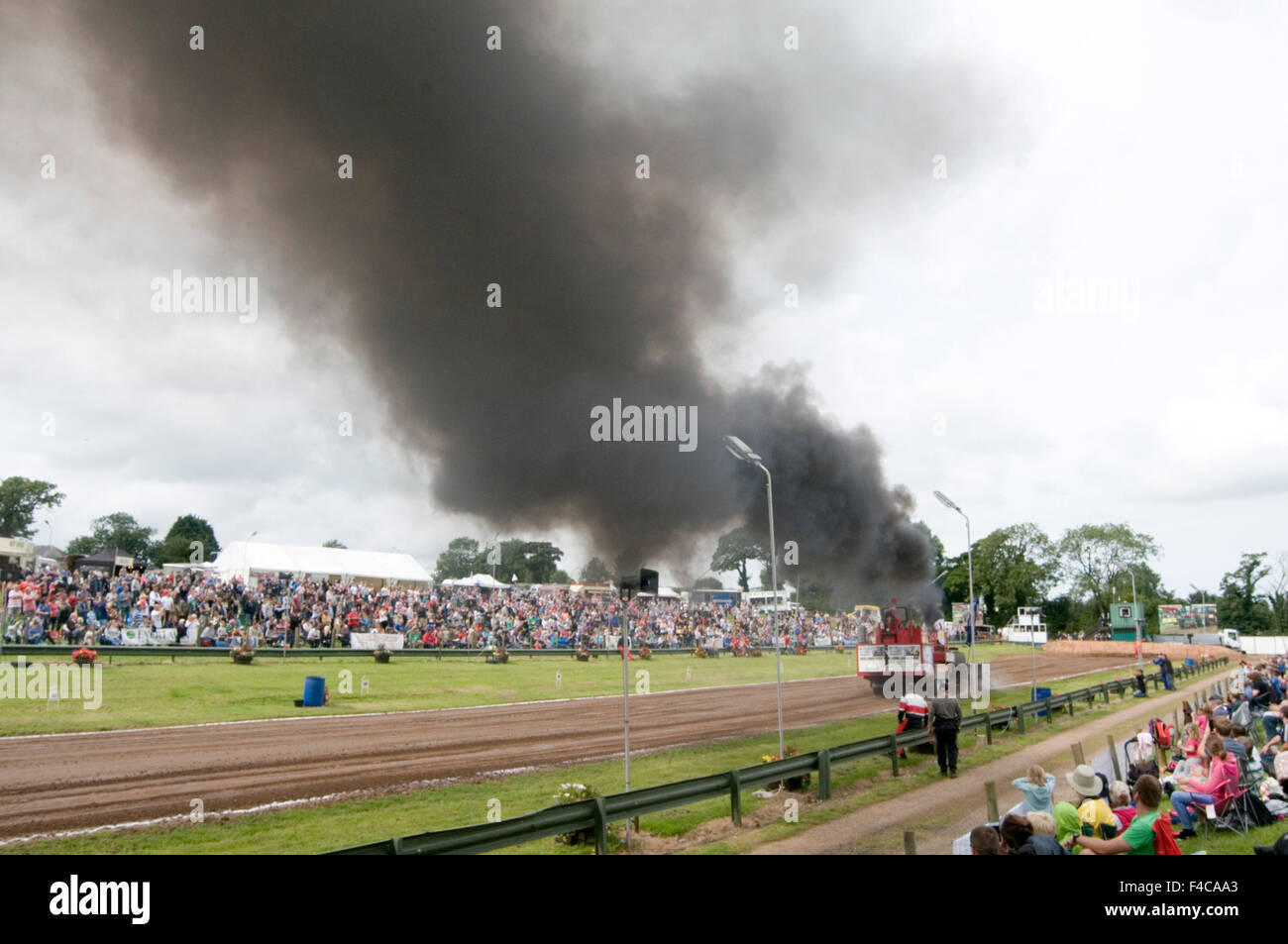 diesel emissions scandal thick black smoke over fueling vw volkswagen particulates particles unburnt smokey smoking exhaust pipe Stock Photo