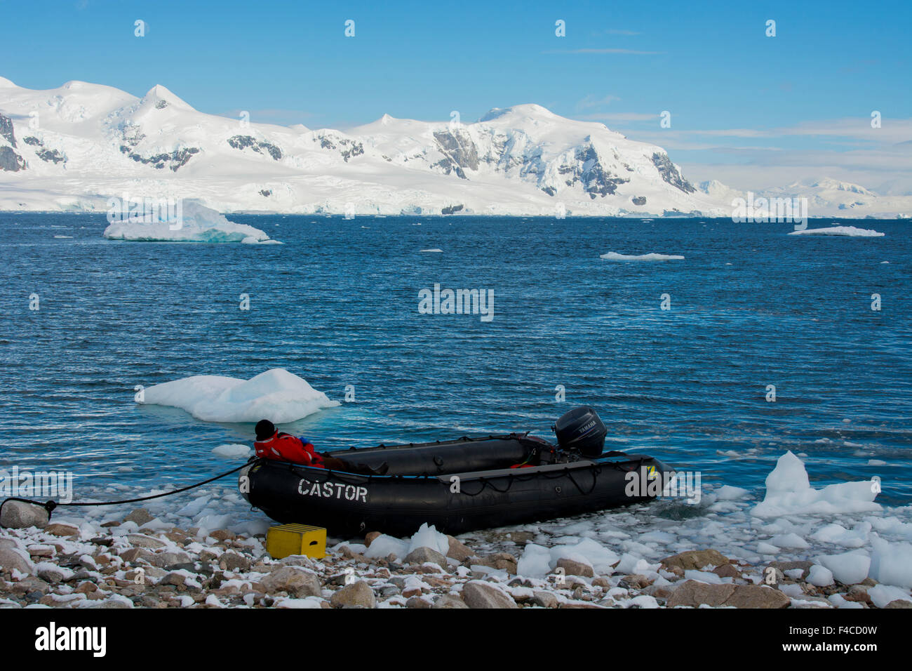 Antarctica. Neko Harbor. Expedition crew resting in a zodiac. Stock Photo
