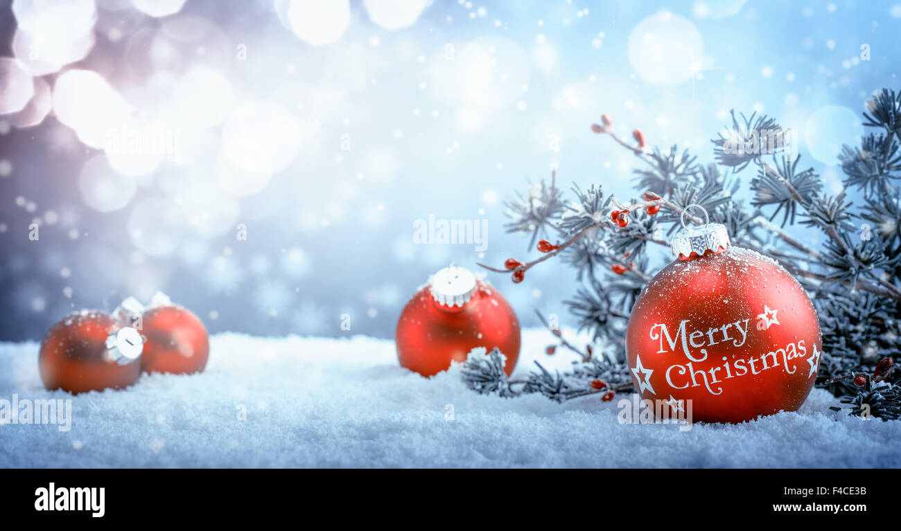 Christmas ball and fir branch on abstract background Stock Photo