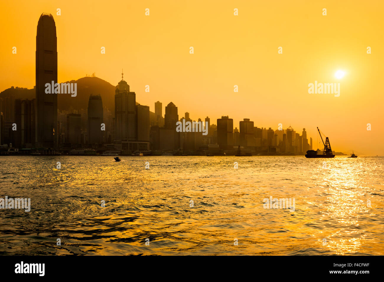 Hong Kong Harbour at sunset Stock Photo - Alamy
