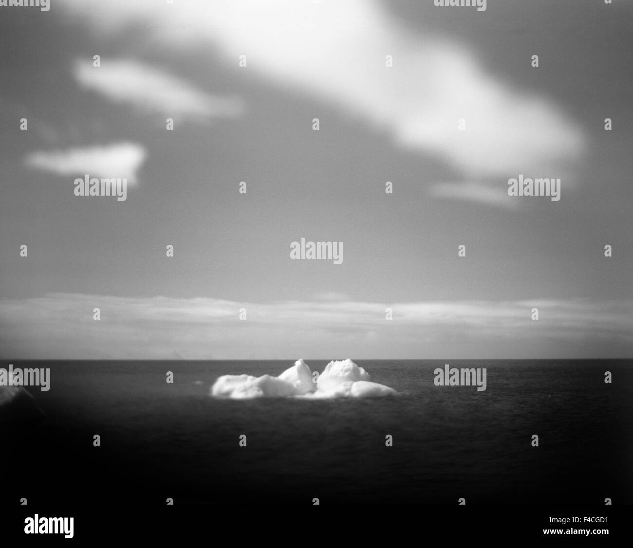 Antarctica, Blurred black and white image of massive iceberg floating near Deception Island in the South Shetlands. Stock Photo