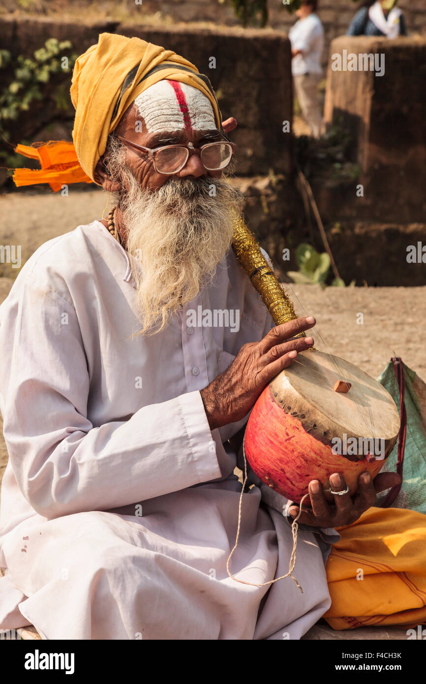 India, Madhya Pradesh, Tikamgarh District, Indian sadhu holding an ektara (a traditional Indian instrument) Stock Photo