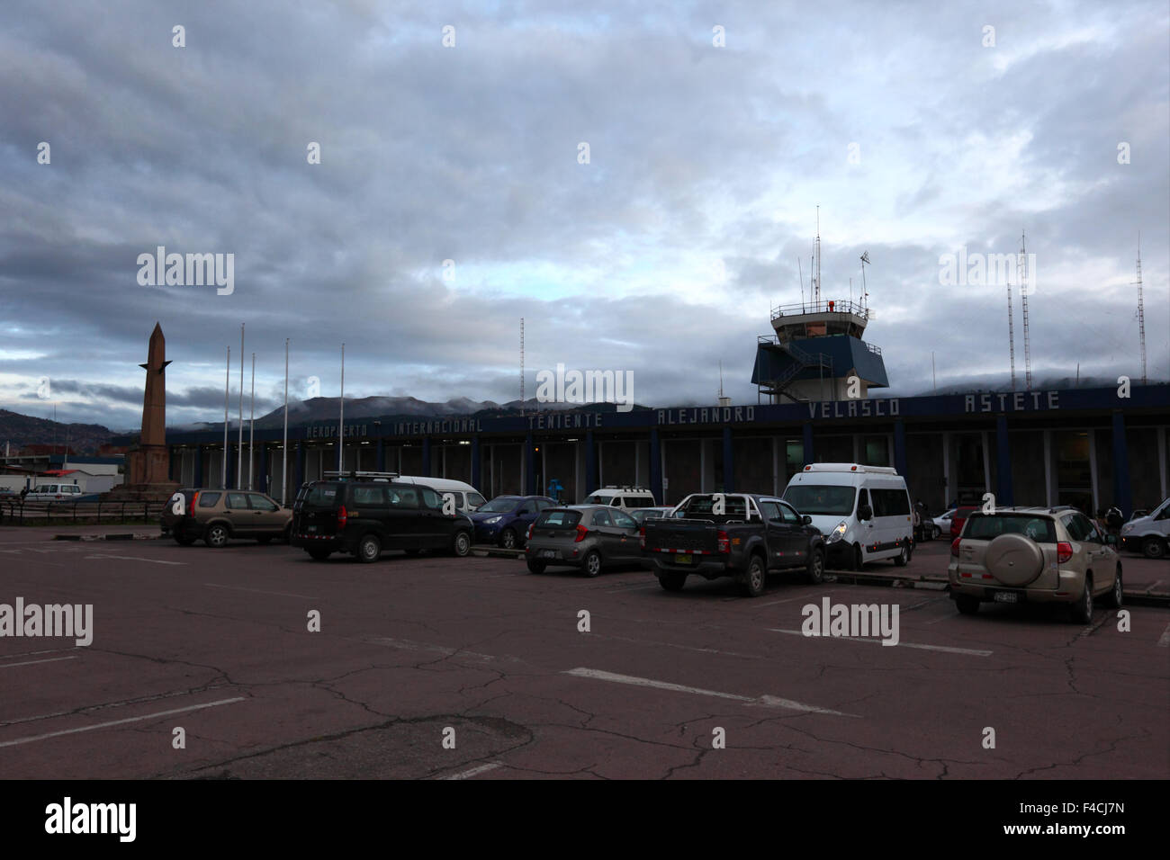 Vehicles parked in car park outside Alejandro Velasco Astete International Airport CUZ, Cusco, Peru Stock Photo