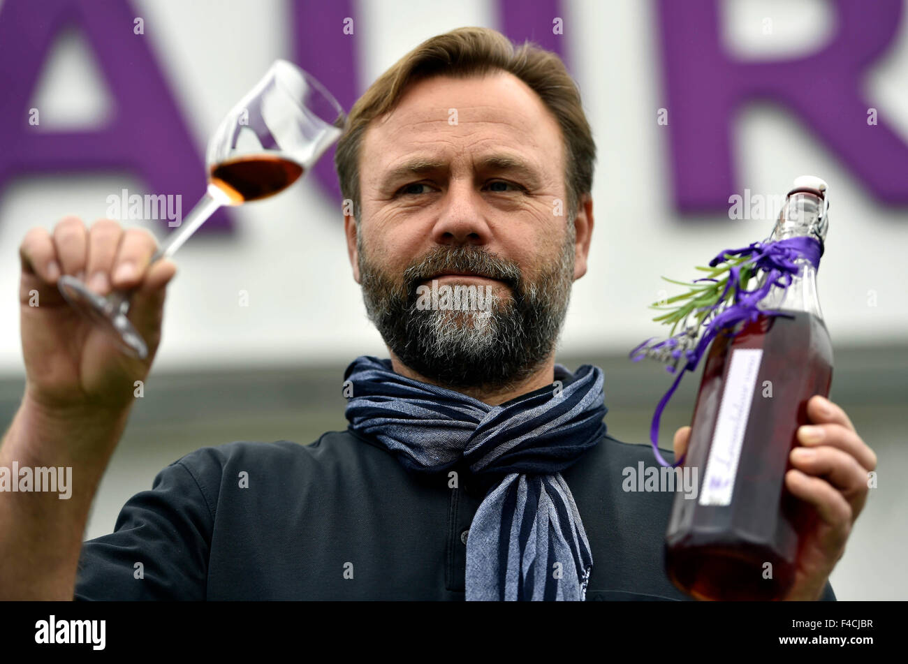 Novosedly, Czech Republic. 16th Oct, 2015. Wine grower Petr Marcincak starts the process of lavender wine pressing in Novosedly, Czech Republic, October 16, 2015. Lavender wine has a light violet colour and a distinctive scent of lavender, however, it results in a very pleasing and calming impression. The taste is fruity, spicy and full-bodied with the aftertaste of lavender honey. Petr Marcincak is the first and only winemaker in the World, which manufactures lavender wine. © Vaclav Salek/CTK Photo/Alamy Live News Stock Photo