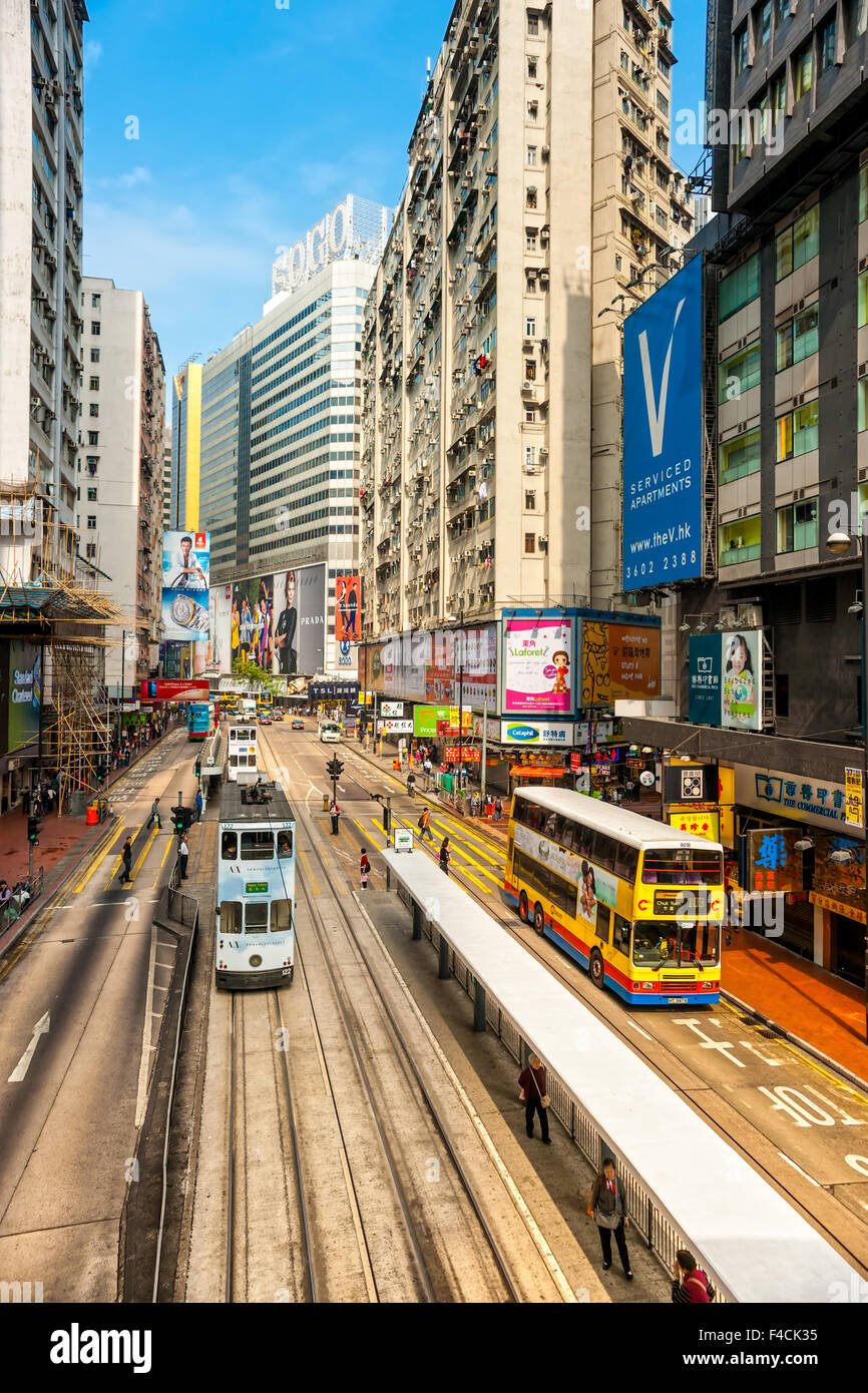 HONG KONG - MARCH 03: Wide angle view on the street on March 03, 2013 in Hong Kong. With a land mass of 1,104 km and a populatio Stock Photo