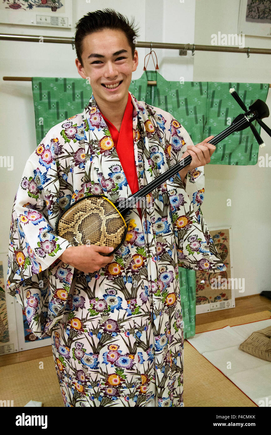 Visitors to the Prefectural Museum in Naha, Okinawa, Japan have the ...