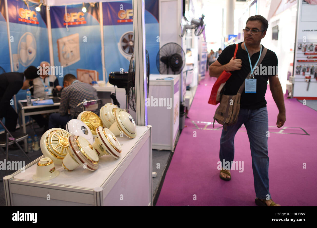(151016) -- GUANGZHOU, Oct. 16, 2015 (Xinhua) -- A visitor is seen at the Pakistan booth during the China Import and Export Fair, or the Canton Fair, in Guangzhou, capital of south China's Guangdong Province, Oct. 16, 2015. A total of 353 enterprises from countries and regions along the 'Belt and Road' participated the current Canton Fair held in Guangzhou, which took nearly 60 percent of all exhibitors. The 'Belt and Road' initiative, standing for the Silk Road Economic Belt and the 21st Century Maritime Silk Road, was unveiled by Chinese President Xi Jinping in 2013. It brings together count Stock Photo