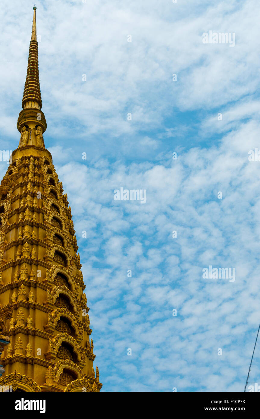 Temple Golden Top in front of beautiful blue and cloudy sky Stock Photo