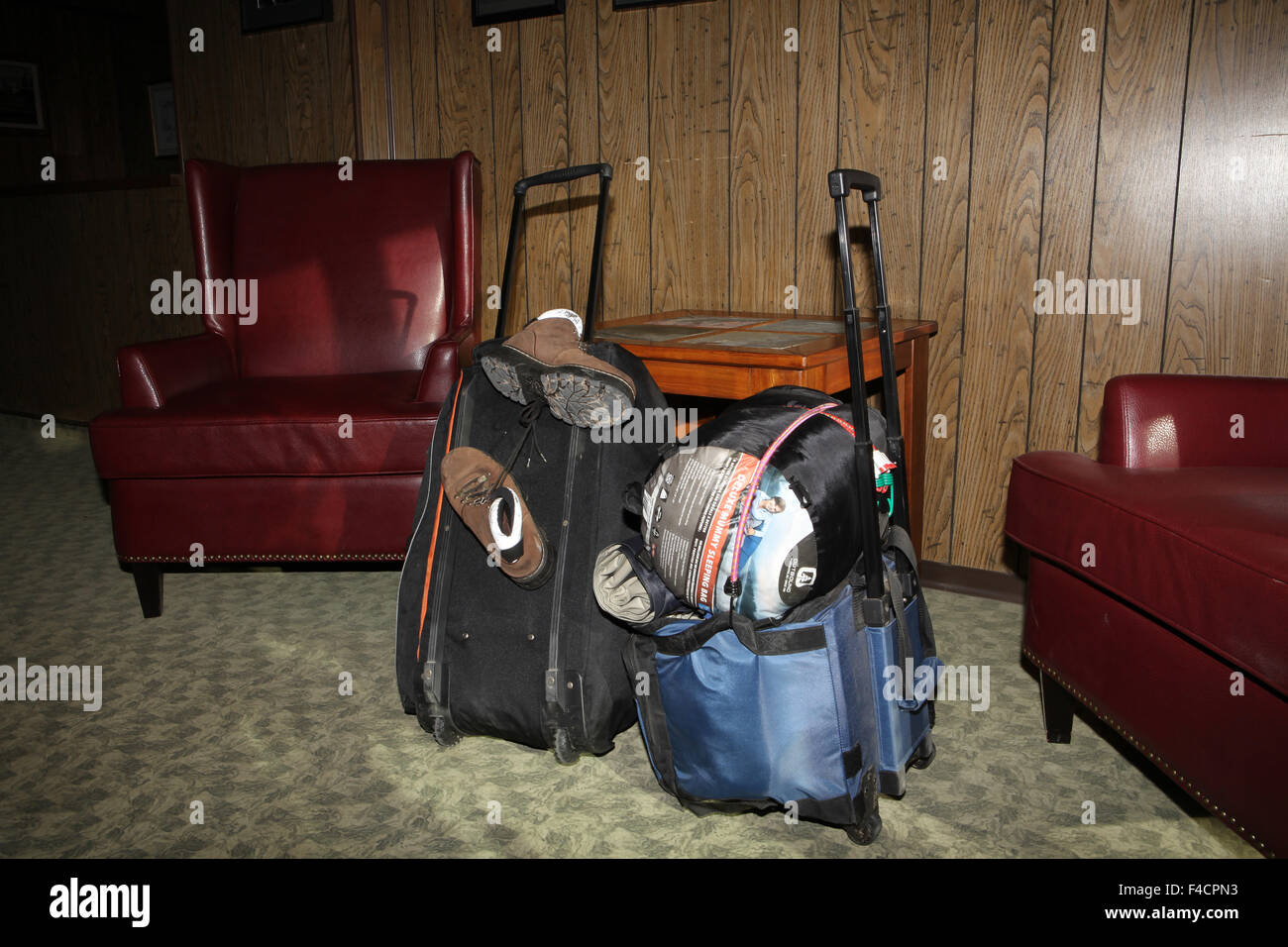 Back packs and baggage in a hotel lobby. Stock Photo