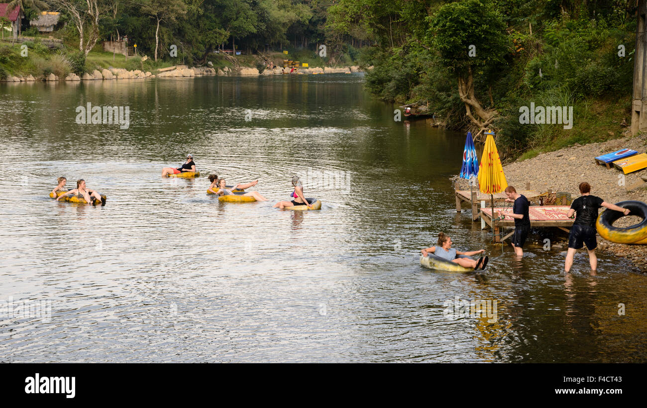 Laos, Vang Vieng. Tourists floating on inner tubes. (Large format sizes