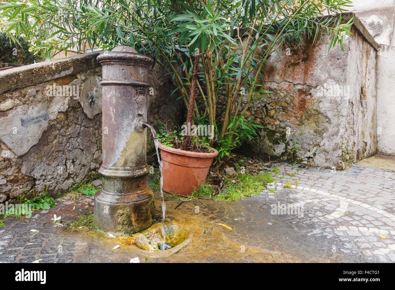 Typical nasone (cast iron fountain) in Rome, Italy Stock Photo