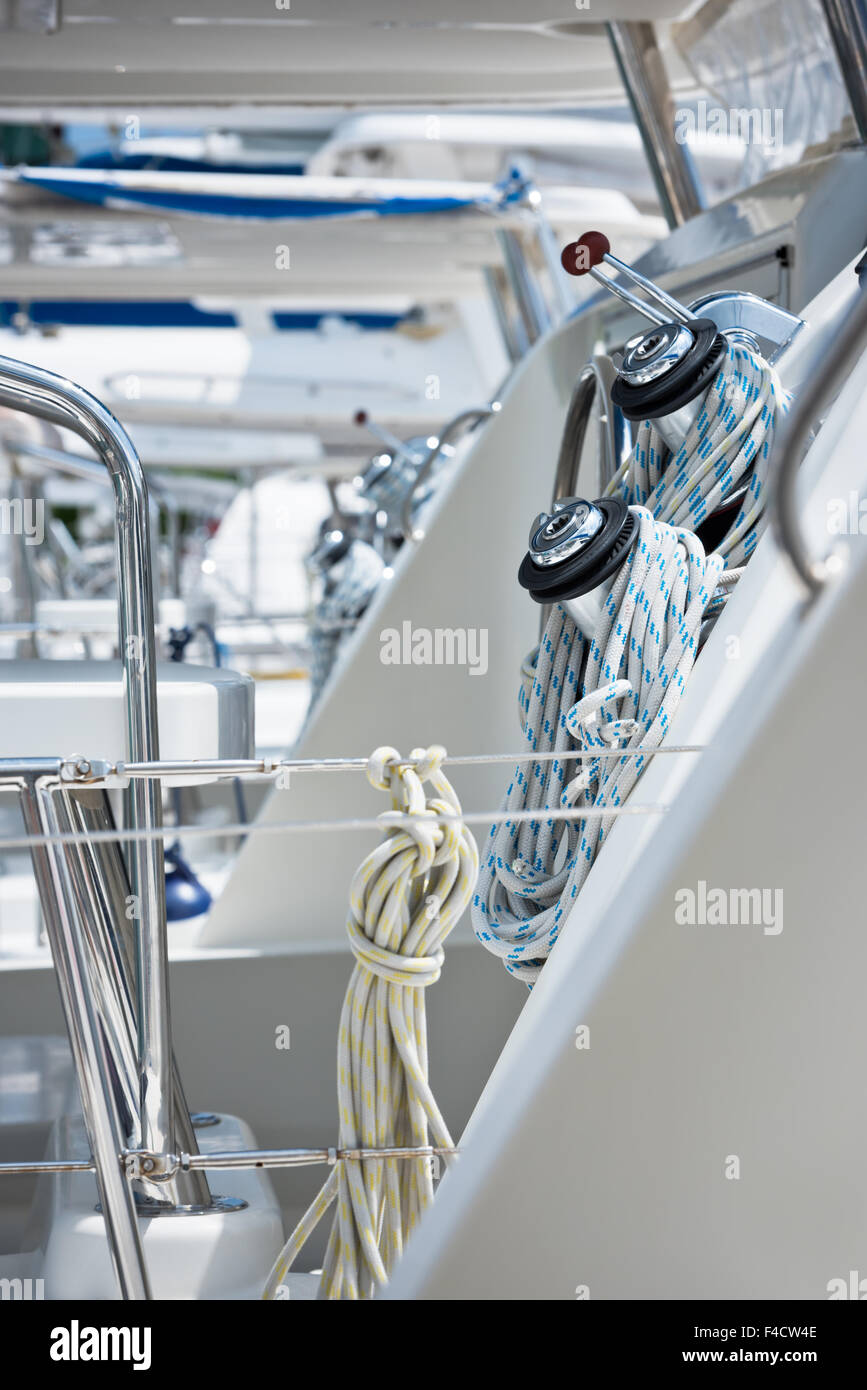Winches and ropes, sailing yacht detail. Vertical shot Stock Photo Alamy