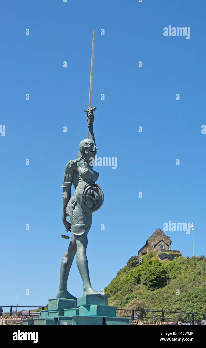 N.DEVON; ILFRACOMBE HARBOUR; 'VERITY' BY DAMIEN HIRST; ST.NICHOLAS CHAPEL IN BACKGROUND Stock Photo