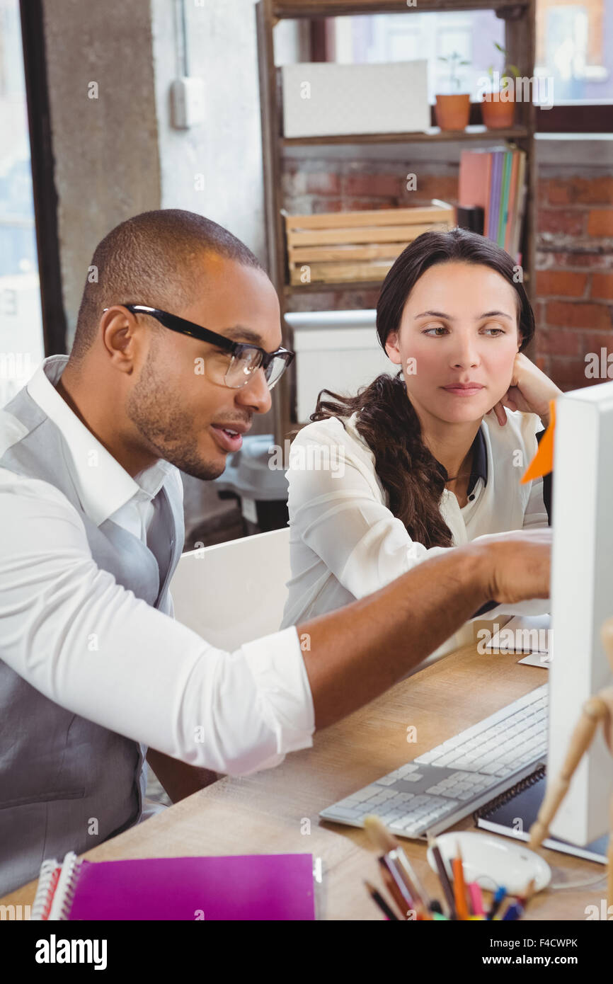 Colleagues discussing at office Stock Photo