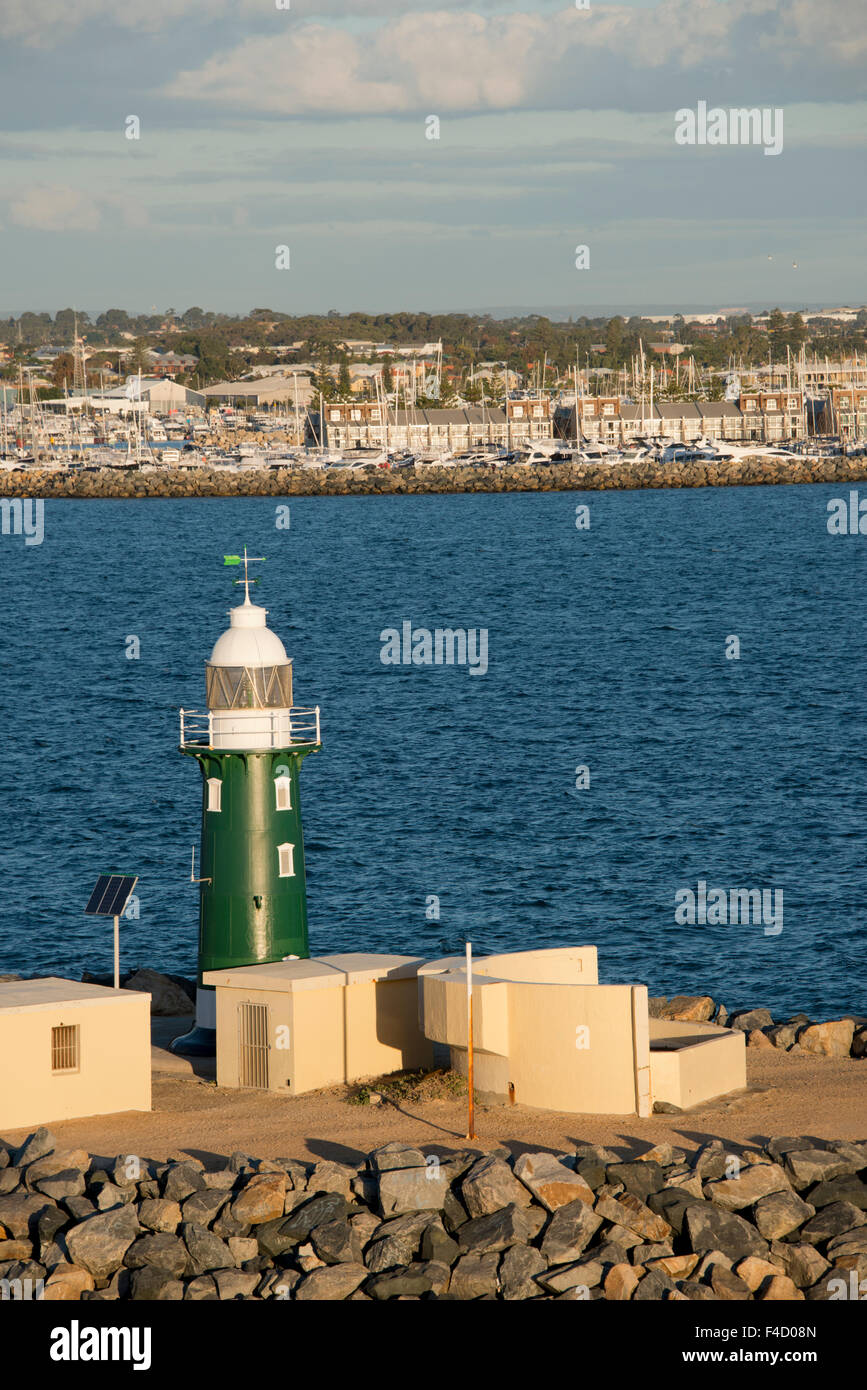 Australia, Fremantle. Port area on the Swan River and Fisherman's Harbor. Lighthouse at the end of breakwater jetty. (Large format sizes available) Stock Photo
